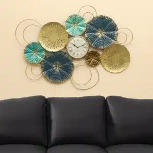 Metal Akoko Round Wall Decor With Clock featuring teal lotus disc motifs and gold accents, large botanical metal wall art by Vedas Homes