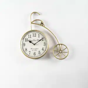 Ancient Wheel Metal Abstract Wall Clock with brass-finish penny-farthing bicycle design and Roman numeral dial by Vedas Homes