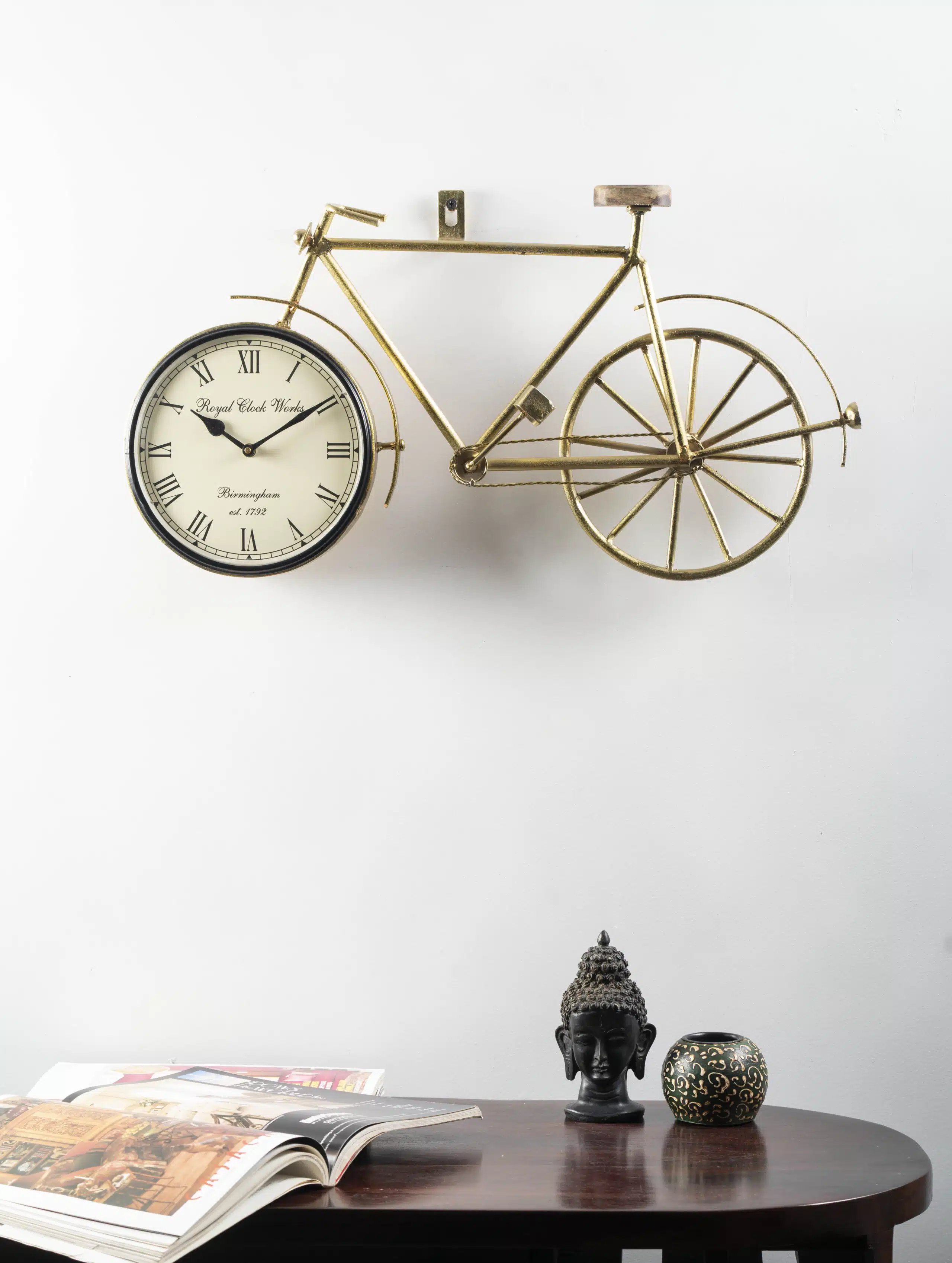 Gold Joy Metal Cycle Wall Clock shaped as a vintage bicycle with dial in the front wheel