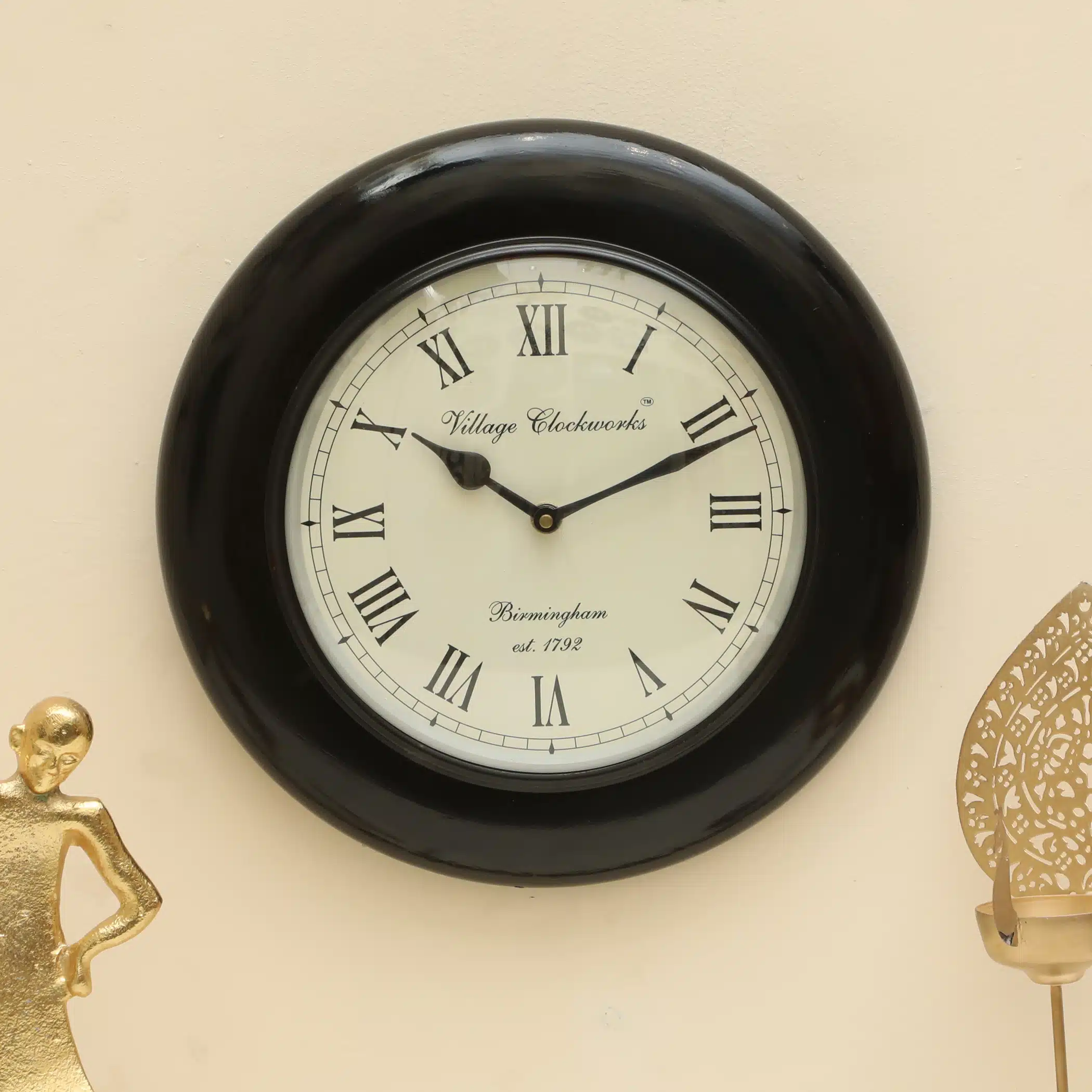 Senegal Heritage Wooden Polished Wall Clock with deep black frame and cream Roman numeral dial by Vedas Homes